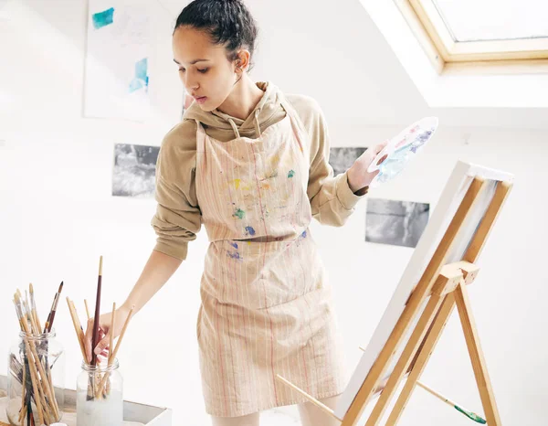 Attractive Young Woman Painting Canvas Her Studio — Stockfoto