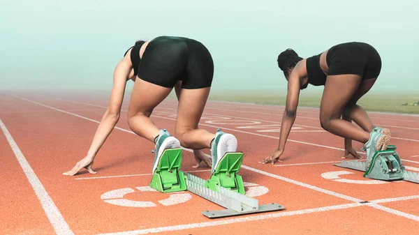 Rearview shot of two unrecognizable young sportswomen taking their mark on starting blocks.