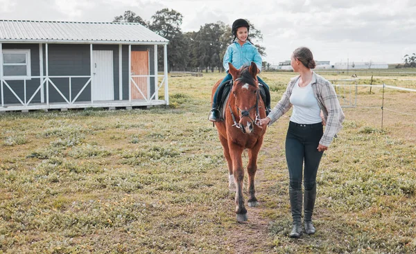 Female Instructor Taking Little Girl Horse Riding — Photo