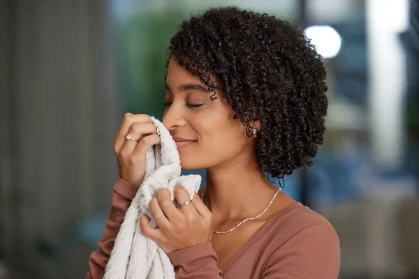 Attractive Young Woman Smelling Freshly Washed Towel While Spring Cleaning — Foto Stock