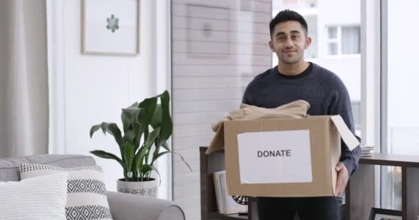 Video Footage Man Holding Box Clothes Word Donate Home — Stock Video