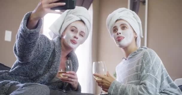 Video Footage Two Young Women Taking Selfies While Having Facials — Wideo stockowe