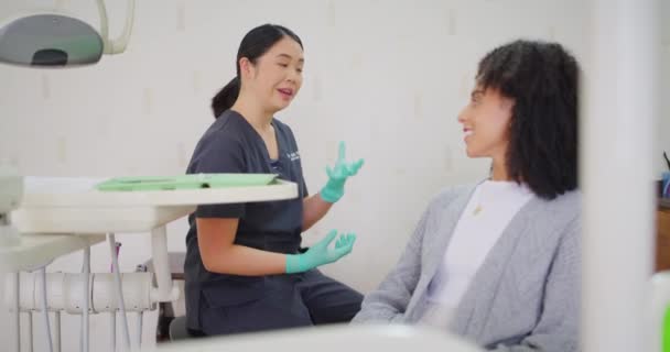 Dentist Patient Consulting Discussing Office Two Women Talking Best Treatment — Video
