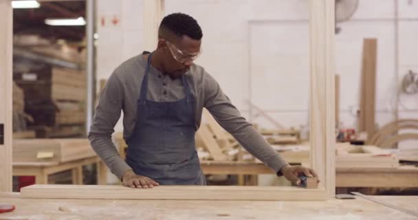 Video Footage Young Man Working Carpentry Sanding Piece Wood — Stockvideo