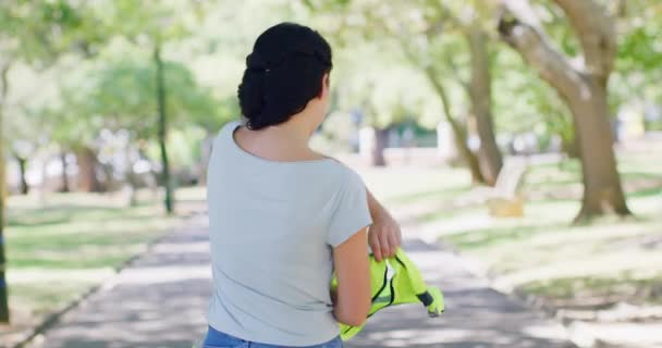 Rearview Woman Putting Reflective Safety Vest Representing Authority While Standing — Vídeo de Stock