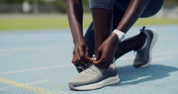 Closeup African Female Athlete Tying Shoe Laces Jogging Active Fit — Stockvideo