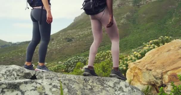 Two Happy Women Hiking Rocky Mountain Windy Day Active Females — Stockvideo