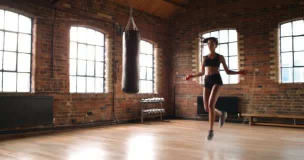 Fit Young Woman Focused While Jumping Skipping Rope Active Young — 图库视频影像