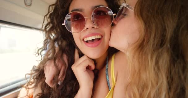 Two Happy Women Affectionately Kissing One Another Cheek Holiday — Vídeo de Stock