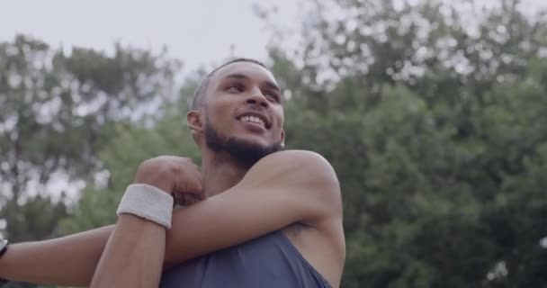 Young Male Athlete Stretching Arms Prepare His Body Workout Park — Wideo stockowe