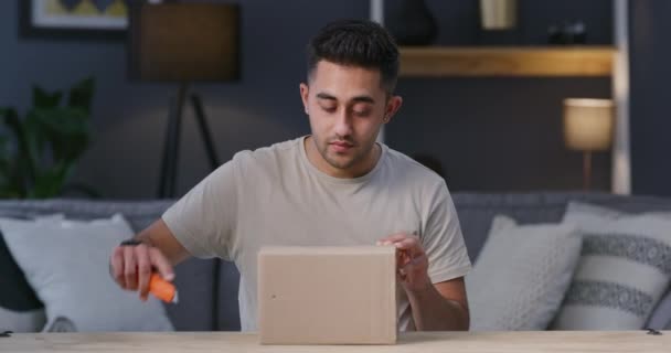 Video Footage Young Man Opening Package Home — Stock Video