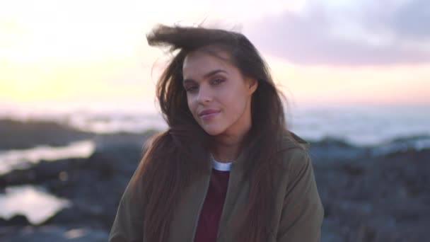 Young Woman Enjoying Sunrise Promenade Her Hair Blowing Her Face — Video