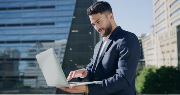 Video Footage Handsome Young Businessman Using His Laptop While Standing — Stock Video