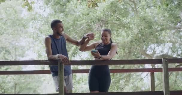 Two Fit Athletes Doing High Five Bridge Park Summer Day — Stockvideo