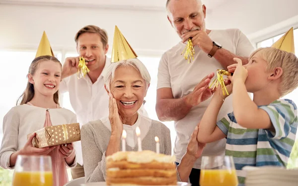 Senior Woman Celebrating Her Birthday Family Home Wearing Party Hats — Foto de Stock