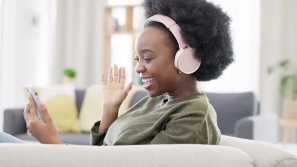Cheerful African Afro Woman Using Phone Headphones Waving While Video — Video