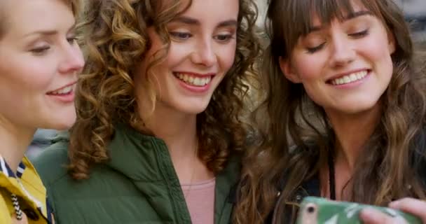 Women Using Phone Selfies Capturing Memories Downtown While Bonding Together — Vídeo de Stock