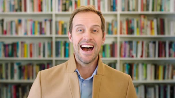 Portrait Laughing Teacher Showing Fun Playful Facial Expression School Library — Stockvideo