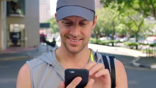 Athlete Using His Phone Outdoors Urban Town Trendy Sporty Man — Stockvideo