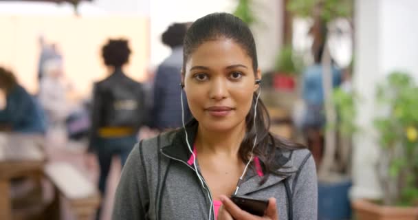Portrait Active Woman Listening Music Earphones Holding Phone Happy Athlete — Stok video