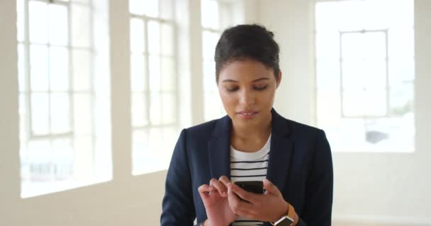 Happy Business Woman Typing Her Phone Thinking Smiling Indian Female — Vídeos de Stock