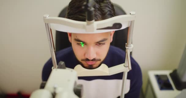 Male Patient Optometrist Doing Retina Eye Scan Annual Appointment Examine — Video
