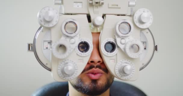 Male Patient Doing Eye Test Optometry Machine Closeup Young Man — 图库视频影像