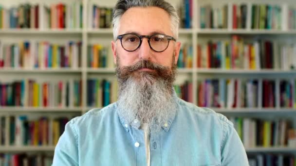 University Lecturer Literature Professor Standing Front Library Bookshelf Portrait Serious — 图库视频影像