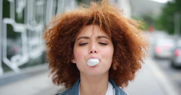 Closeup Portrait Face Head Beautiful Young Woman Afro Chewing Gum — 图库视频影像