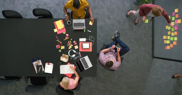 Group Diverse Students Using Technology Sitting Corporate Workplace Bright Informal — Stock video