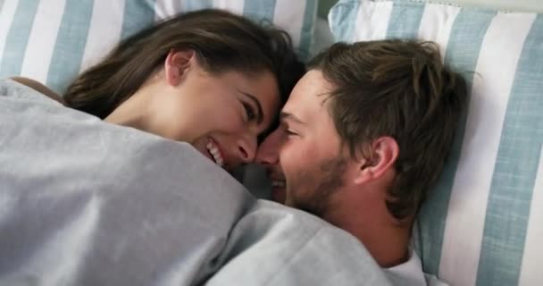 Video Footage Affectionate Young Couple Sharing Intimate Moment While Lying — Stock videók