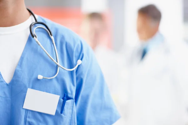 Cropped Image Male Surgeon Wearing Nametag Alongside Copyspace – stockfoto