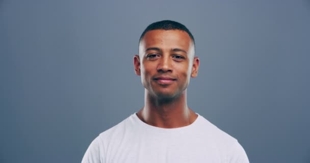 Video Footage Young Man Showing Hand Sign Grey Background — Vídeo de Stock