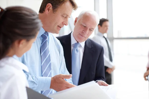 Focused Businesspeople Going Documents Together Informal Meeting —  Fotos de Stock