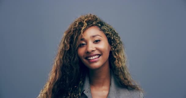 Video Footage Young Woman Showing Peace Sign Grey Background — Stockvideo