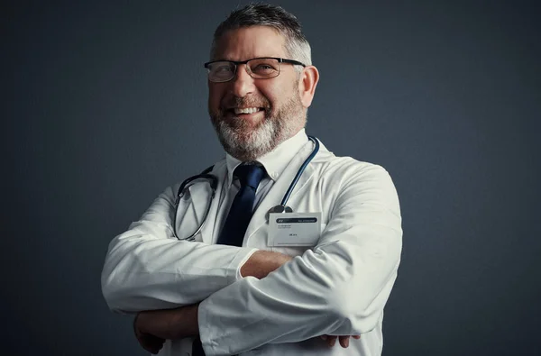 Studio Shot Handsome Mature Male Doctor Looking Thoughtful While Standing — Stockfoto