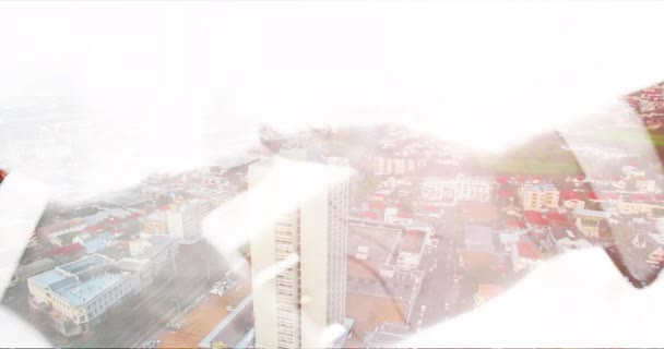 Video Footage Two Unrecognizable Businesspeople Shaking Hands Superimposed Modern Cityscape — Stockvideo
