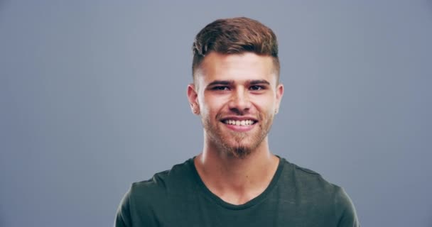 Video Footage Young Man Winking Grey Background – Stock-video