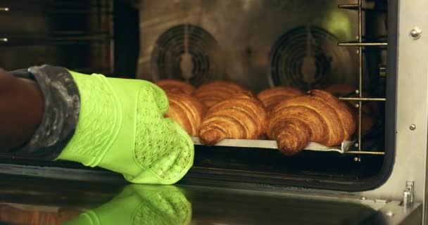 Video Footage Unrecognizable Baker Removing Croissants Oven Bakery — Αρχείο Βίντεο