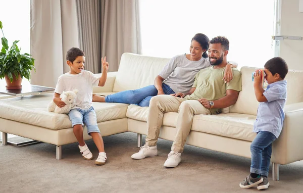Young Mixed Race Family Bonding Lounge While Parents Relax Couch — Φωτογραφία Αρχείου