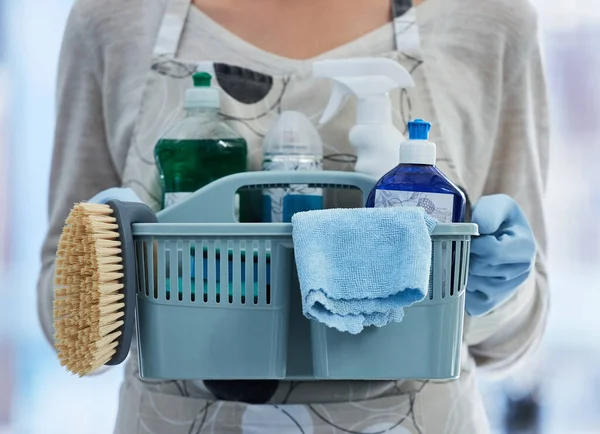 One Unknown Mixed Race Woman Holding Cleaning Supplies While Cleaning — Foto de Stock