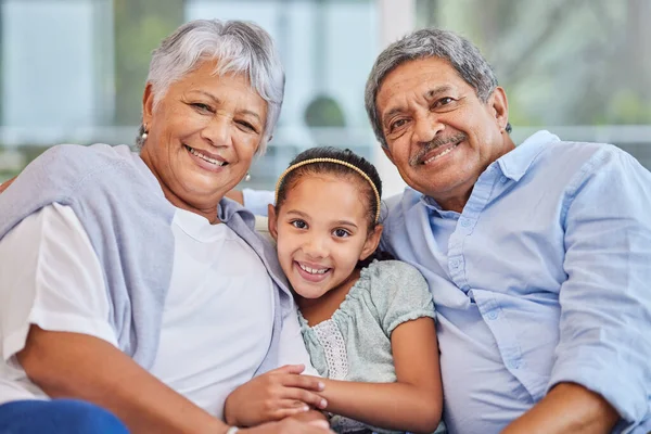 Portrait Affectionate Mixed Race Senior Couple Relaxing Living Room Granddaughter —  Fotos de Stock