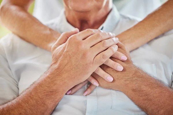 Closeup Doctor Holding Hands Patients Chest Showing Support Recovery Unrecognizable — Stockfoto