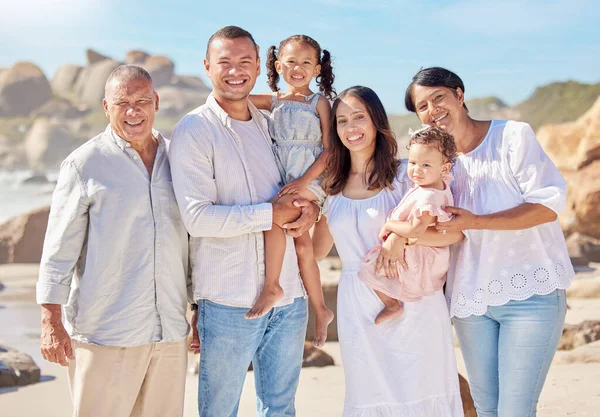 Portrait Smiling Mixed Race Family Little Girls Standing Together Beach — Stock fotografie