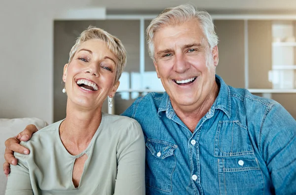 Happy Relaxed Mature Retired Couple Talking Laughing Together Living Room — Foto de Stock