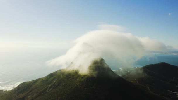 Drone Films Clouds Mountaintop Coast — стоковое видео