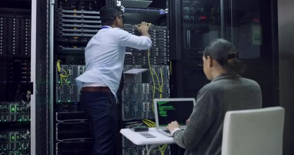 Video Footage Two Technicians Using Technology Code Server Room — Stockvideo
