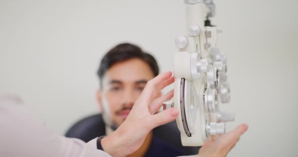 Optometrist Using Eye Phoropter Machine Examine Patients Refractor Strength Clinic — Video