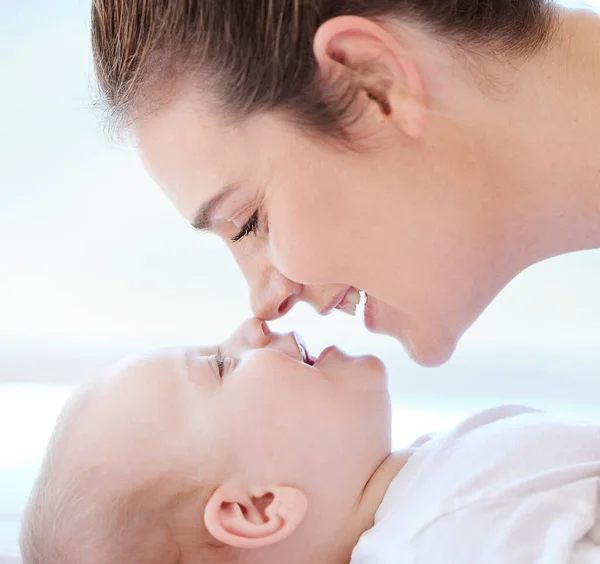 Young Mother Bonding Her Adorable Baby Boy Home – stockfoto