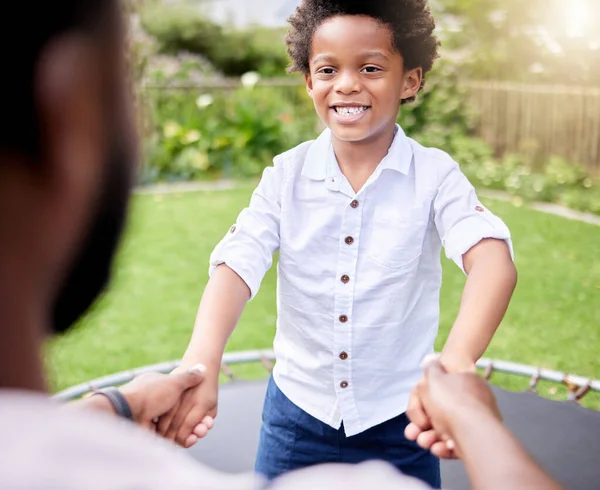 Little Boy Jumping Trampoline His Father Outdoors — Stock Fotó